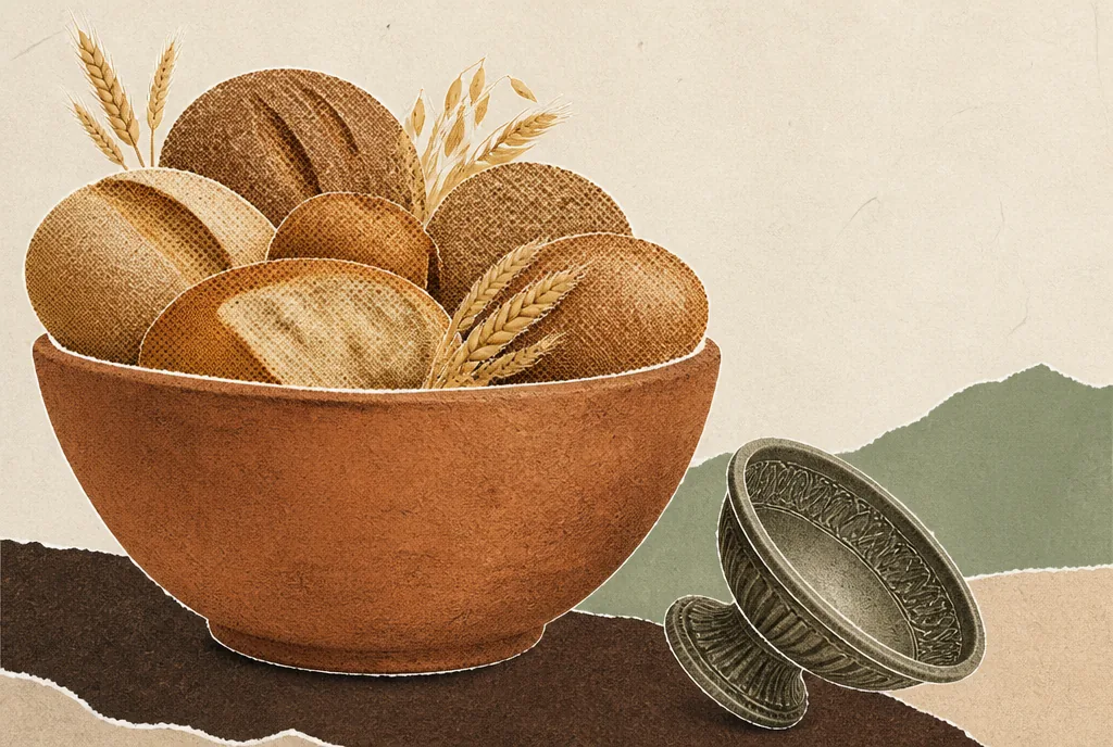 A large plain clay bowl piled high with bread and grain fills most of the picture. Beside it, smaller and tipped on its side, an ornate footed dish sits completely empty.